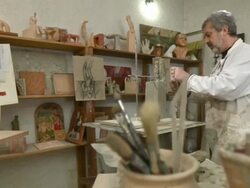 HD DOLLY: Sculpture Artist Making Clay Statue Stock Footage