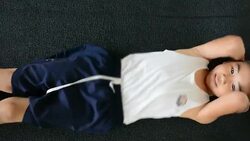 Children Exercising Sit Ups Stock Footage