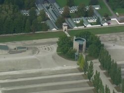 MS AERIAL ZO Shot of entrance get of Dachau concentration camp / Germany Stock Footage