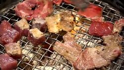 Japanese style Raw fresh beef on hot barbecue grill Stock Footage