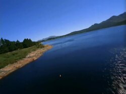 WA Aerial tracking over river tributary, South Africa Stock Footage