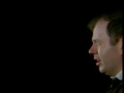 High Speed - MCU side view man sneezing, black background Stock Footage