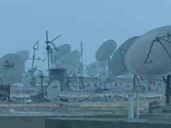 MS Shot of sunrise with birds flying over parabolas / Le Le Caire, China Stock Footage