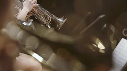 Musician playing French horn during concert Stock Footage