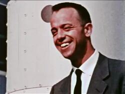 1959 close up PORTRAIT astronaut Alan Shepard, Jr. in suit + tie smiling outdoors / newsreel Stock Footage