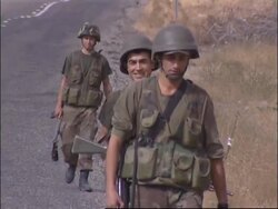 WRAP Troops on foot patrol, search for mines, helicopter Instructional Video