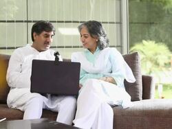 Senior couple chatting on a laptop  Stock Footage