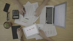 Business person analyse financial data in overhead angle Stock Footage