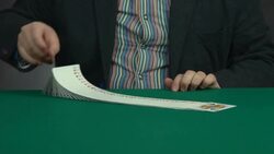 A magician playing with a deck of cards Stock Footage