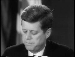 B/W 1962 close up President John F. Kennedy giving speech about Cuban Missile Crisis Stock Footage