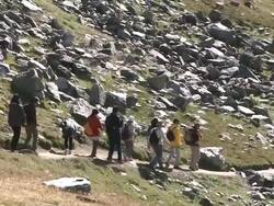 MS TS Guide giving guidence to tourist hiker at rotenboden / Zermatt, Valais, Switzerland Stock Footage