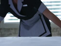 hotel resort getaway lodge bedroom bed sheets woman maid housekeeper making bed Stock Footage