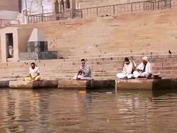 MS Hindu priests performing at ghat near Ganges River / Varanasi, Uttar Pradesh, India Stock Footage
