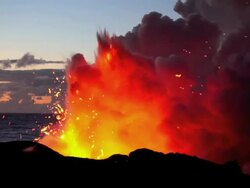 WS View of volcanic eruption with forming steam cloud by ocean at dawn / Kalapana, Hawaii, USA Stock Footage