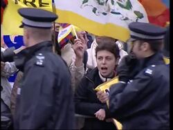 Free Tibet demo greets Hu's visit, scuffles near palace News Clip