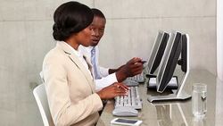 Business people working on computers Stock Footage