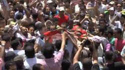 THOUSANDS OF PEOPLE MARCH TO DENOUNCE SHAFIQ DECISION Instructional Video