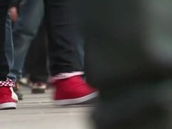 Anonymous feet walking in Xidan, Beijing News Clip
