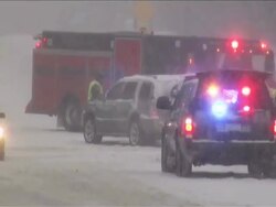 Winter snowstorm. Car traffic on slippery road. Stock Footage