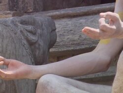 CU TU Man with  painted face holding  his hands in  meditation stance AUDIO / Kathmandu, Central Region, Nepal Stock Footage