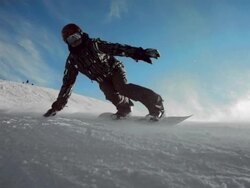 HD Super Slow-Mo: Back Lit Snowboard Carving Stock Footage