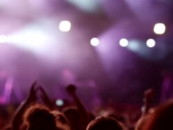 Hands in air at concert Stock Footage