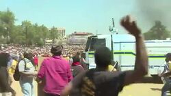 CLEAN : S African police and students clash at government HQ News Clip