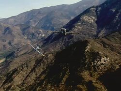 AIR TO AIR, WS, Two Aero L-39 Albatroses flying over Mojave Desert mountains, California, USA Stock Footage