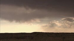 Storm clouds loom above the Kalahari Desert. Stock Footage