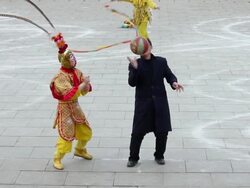 MS Chinese folk artist dresses as Monkey King to performing in Tang Paradise during chinese spring festival  AUDIO  / xi'an, shaanxi, china Stock Footage
