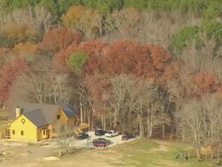 MS AERIAL Shot of farm house with parking area / South Carolina, United States Stock Footage