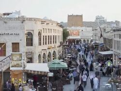 WS POV T/L  Mud rendered shops and exposing timber beams  / Doha, Qatar Stock Footage