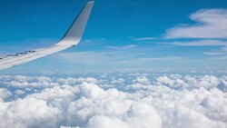 Aircraft wing and beautiful cloud Stock Footage