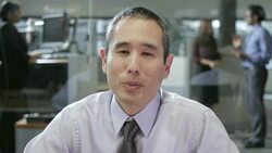 MS East-Asian Businessman Talking At Camera Stock Footage