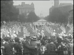 A large crowd of the Ku Klux Klan march in a parade on Pennsylvania Avenue in front of the Capitol Building in Washington D.C. News Clip
