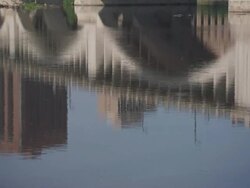 MS Reflection of bridge in river water / Minneapolis, Minnesota, United States  Stock Footage