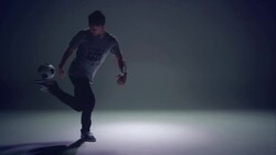 young male soccer freestyler is showing his kick-ups skills. Stock Footage