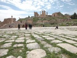 The oval Forum at the Greco-Roman ruins in the Jordanian city of Jerash Stock Footage