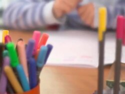 DOLLY: School work Stock Footage