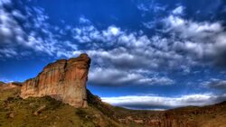 Clouds float above sandstone cliffs. Stock Footage