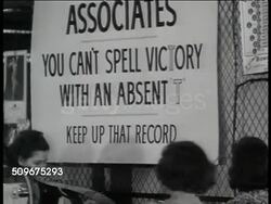 1943: UNCONVENTIONAL WORKPLACE:  Jack & Heintz Precision Industries: People working machines. Sign: 'Associates, You Can't Spelled Victory with an Absent T' Male marking chart no absences for 20 days. WWII, Production. Instructional Video
