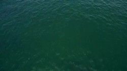 Drone flying thru the ocean surface Stock Footage