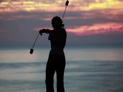 MS Woman poi dancer performing at sunrise / Montezuma, Costa Rica Stock Footage