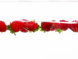 Splasching Strawberry .. Stock Footage