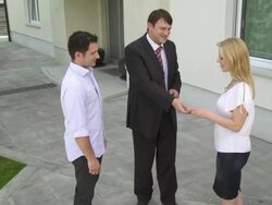 HD CRANE: Realtor Handing Keys To A Couple Stock Footage