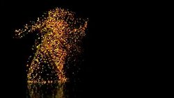 Abstract Ballet Dancer with orange particles Stock Footage