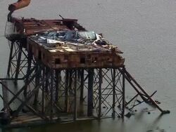 September 10, 2005 Aerial wide shot battered oil rig in swamp / Louisiana Stock Footage