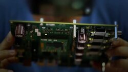 Electronic engineer checking circuit board Stock Footage