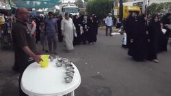 CLEAN : Iraqi Shiite Muslim pilgrims visit Kadhim shrine News Clip