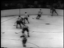 B/W 1961 high angle PAN Redwings playing Blackhawks at Stanley Cup / Olympia Stadium, Detroit / newsreel Stock Footage